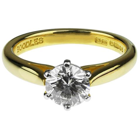 single stone solitaire engagement ring.